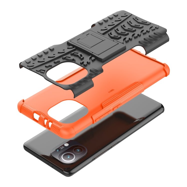 For Xiaomi Mi 11 Tire Texture Shockproof TPU+PC Protective Case with Holder(Orange)