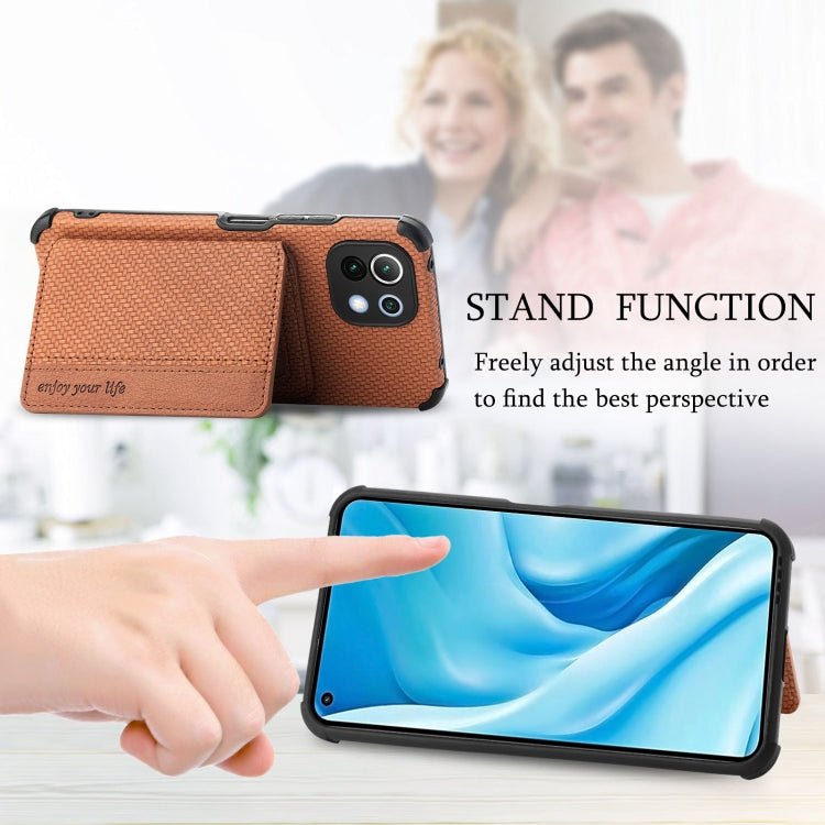 For Xiaomi Mi 11 Lite Carbon Fiber Magnetic Card Bag TPU+PU Shockproof Back Cover Case with Holder & Card Slot & Photo Frame(Brown)